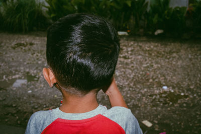 Rear view portrait of boy