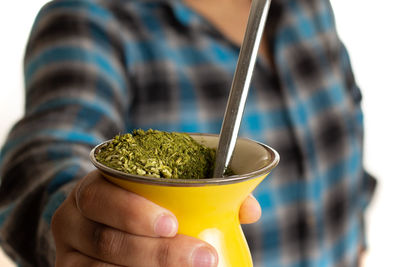 Close-up of hand holding ice cream