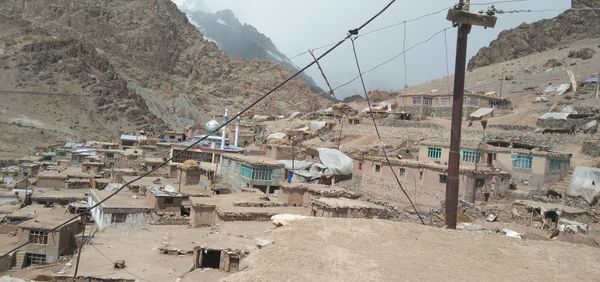 High angle view of construction site by buildings