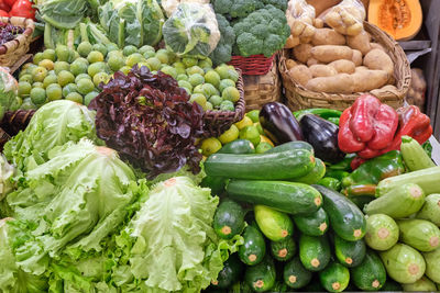 Fresh salad and vegetables for sale at a market