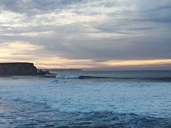 Scenic view of sea against sky during sunset