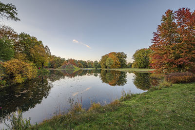 Scenic view of lake against sky during autumn
