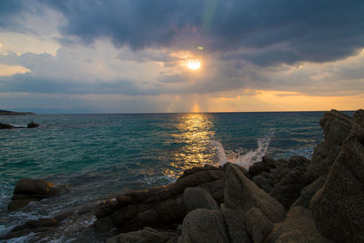 Scenic view of sea against sky during sunset