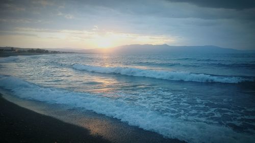 Scenic view of sea at sunset