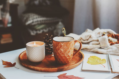 Coffee and cups on table