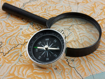 High angle view of arrow symbol on table