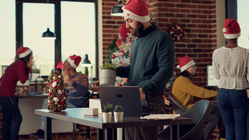 Colleagues working at office