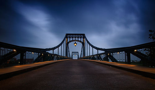 View of bridge against cloudy sky