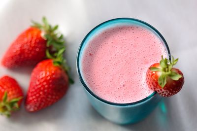 High angle view of strawberries on table