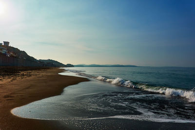 Scenic view of beach against sky