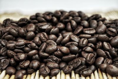 Close-up of coffee beans on table