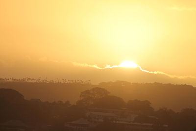 Scenic view of mountains at sunset