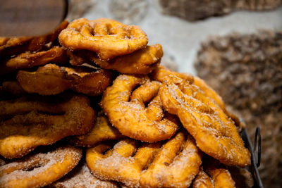 The preparation of a traditional food, sweet fritter called filhós from portugal. made by my grandma