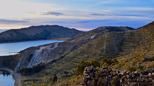 Scenic view of mountains against sky during sunset