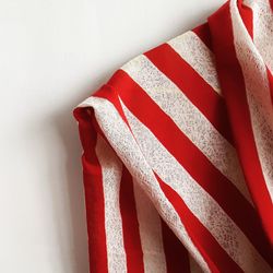 Close-up of american flag against white background