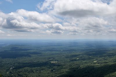 Aerial view of landscape against cloudy sky