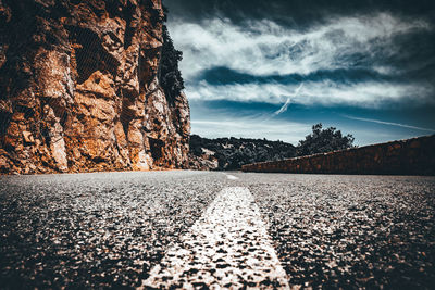 Surface level of road against sky