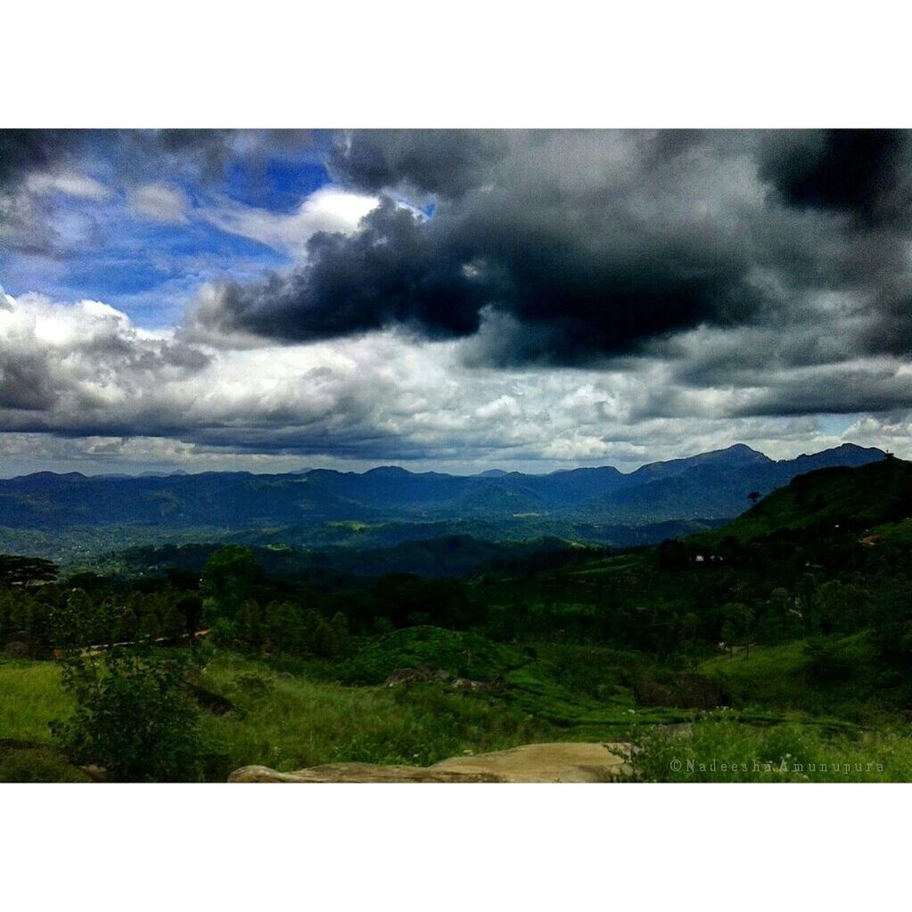 mountain, tranquil scene, sky, scenics, transfer print, tranquility, mountain range, landscape, beauty in nature, cloud - sky, cloudy, auto post production filter, nature, cloud, tree, non-urban scene, idyllic, green color, outdoors, non urban scene