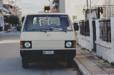 Van parked on roadside in city