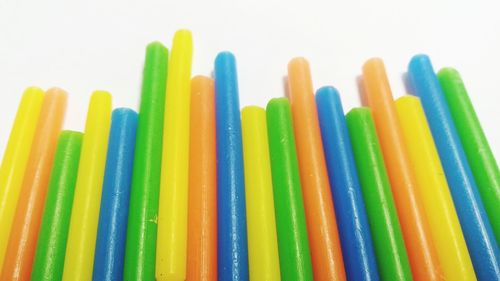 Full frame shot of multi colored pencils against white background