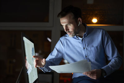 Businessman working late in office