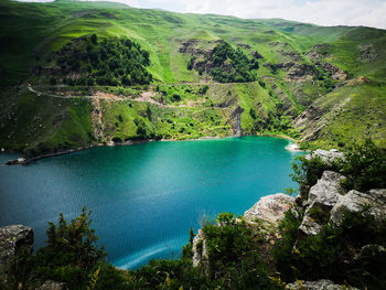 High angle view of lake amidst trees