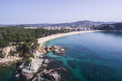 High angle view of bay against clear sky