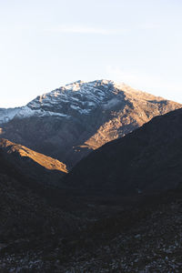 Scenic view of snowcapped mountain against sky