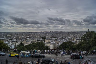 View of city against cloudy sky