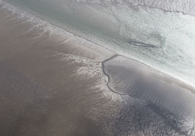 High angle view of snow covered land