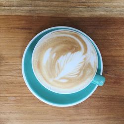 High angle view of cappuccino on table