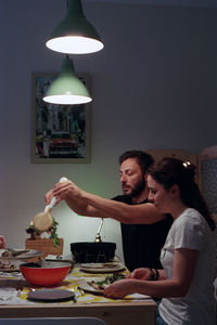 Couple having dinner at home