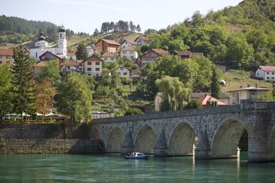 Bridge over river in town