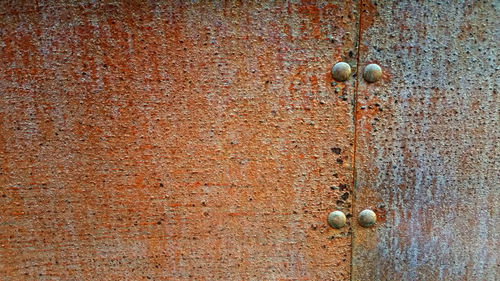 Full frame shot of rusty metal door