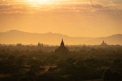 View of temple against sky during sunset