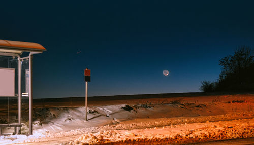 View of road against clear blue sky