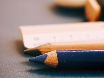 Close-up of colored pencils on table