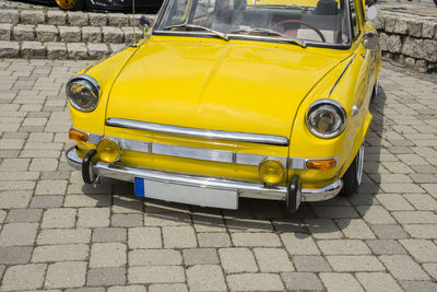 Yellow car on street