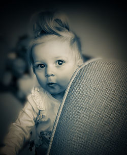 Portrait of cute baby at home