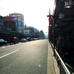 View of city street against clear sky