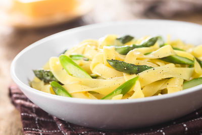 Close-up of noodles in bowl on table