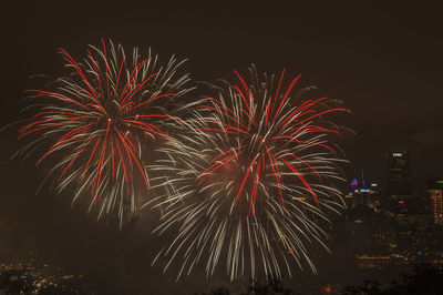 Firework display at night