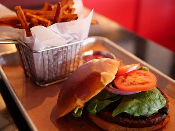 Close-up of burger in basket on table