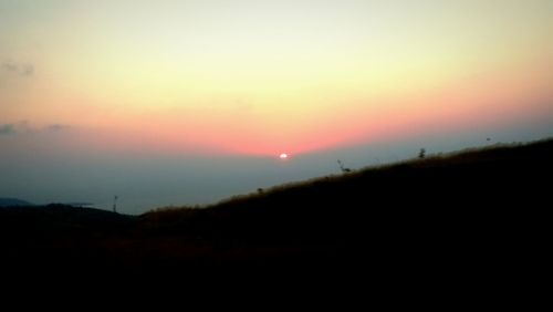 Silhouette of landscape at sunset