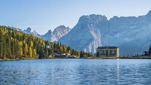 Scenic view of lake and mountains against sky