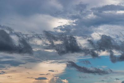 Low angle view of clouds in sky during sunset