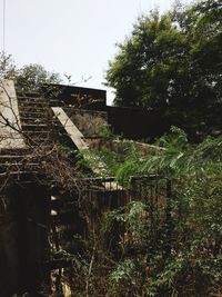 Abandoned building against sky