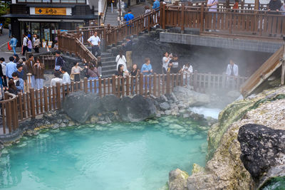 High angle view of people on rocks