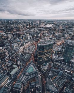 Aerial view of cityscape against sky