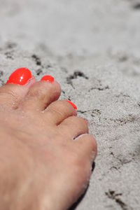 Low section of woman on beach